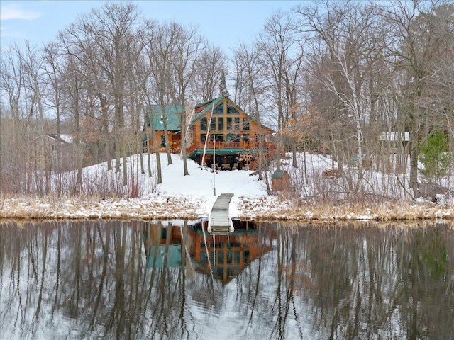 back of house featuring a water view