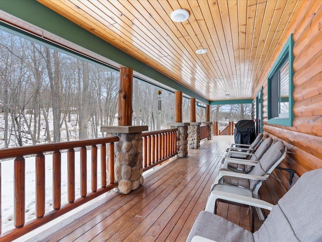 wooden terrace featuring a porch