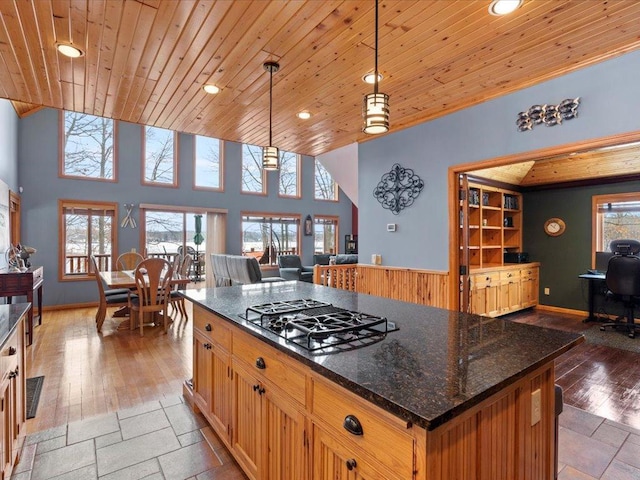 kitchen with black gas stovetop, wood ceiling, recessed lighting, open floor plan, and hanging light fixtures