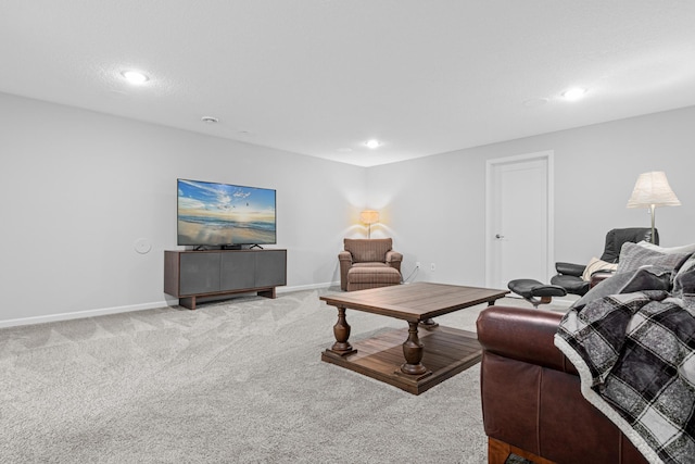 carpeted living room with baseboards and recessed lighting
