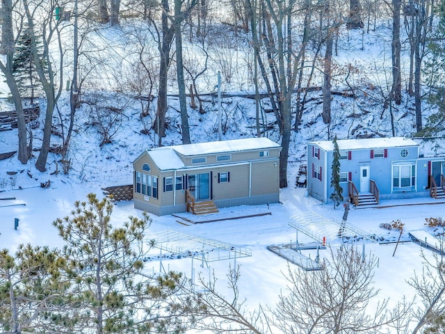 view of front of property featuring a sunroom