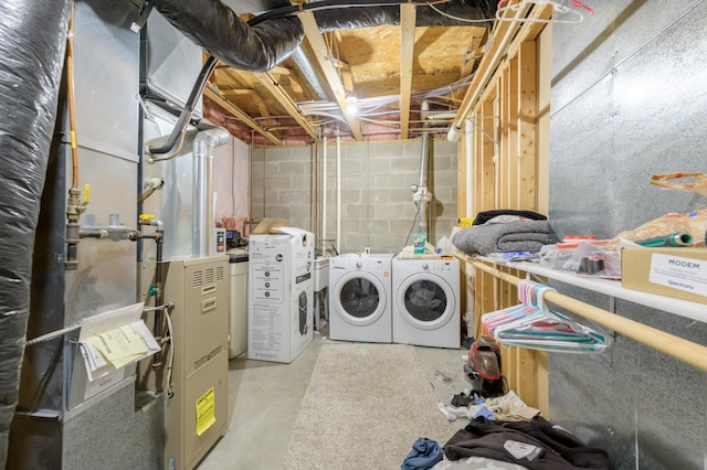 washroom with independent washer and dryer