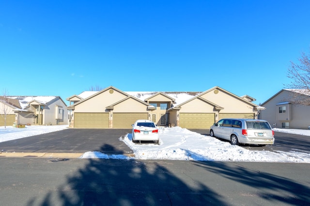 ranch-style home with a garage