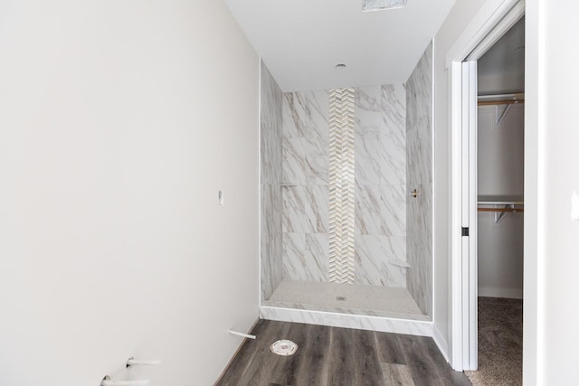 1705 Brandt Dr NE, Byron, MN 55920 - bathroom featuring tiled shower and hardwood / wood-style floors