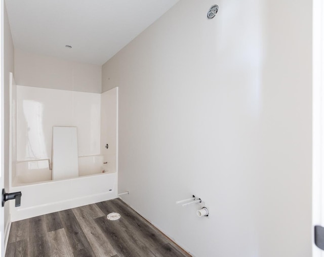 1705 Brandt Dr NE, Byron, MN 55920 - bathroom featuring hardwood / wood-style floors and washtub / shower combination