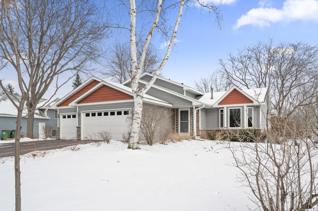 craftsman-style house featuring a garage