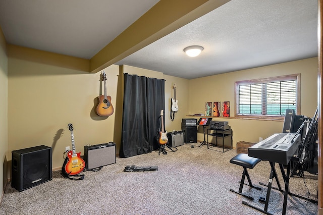 interior space with a textured ceiling and carpet flooring