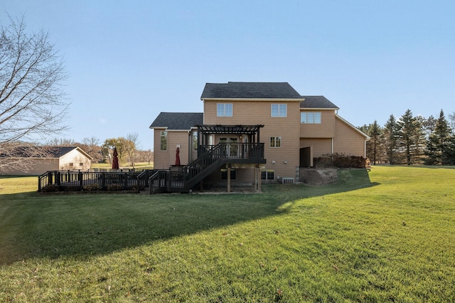 rear view of house featuring a deck, a lawn, and a pergola