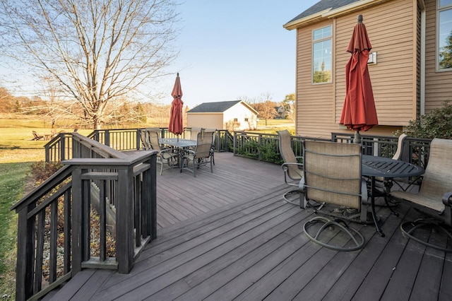 wooden deck with outdoor dining area