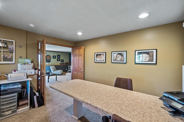 office with carpet flooring and recessed lighting