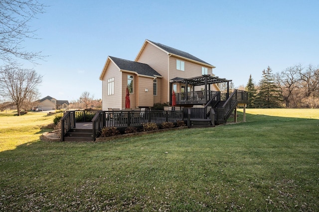 rear view of property featuring a lawn, a wooden deck, and a pergola