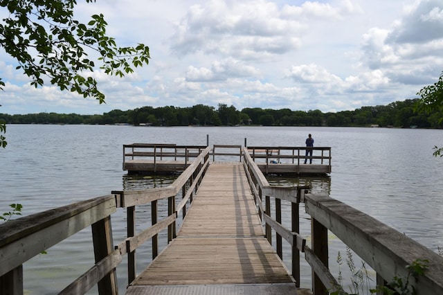 view of dock with a water view