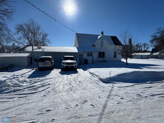 view of snow covered house