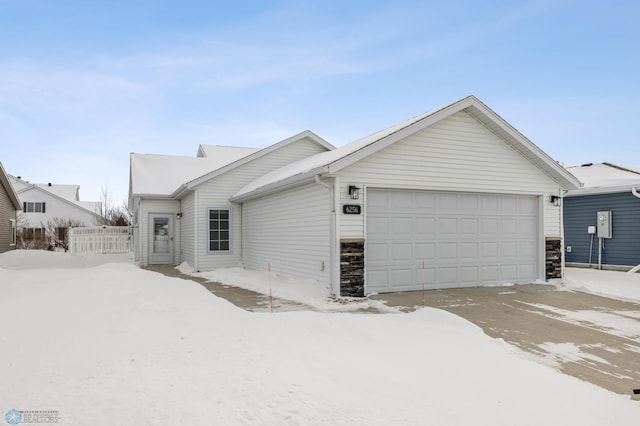 view of front of property featuring a garage