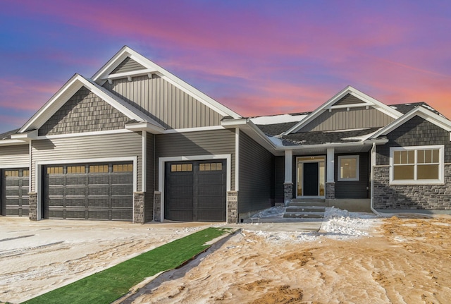 craftsman house with a garage