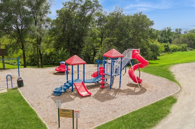 view of jungle gym featuring a yard