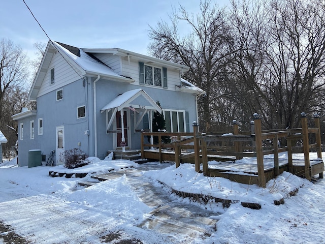 view of front of property featuring cooling unit