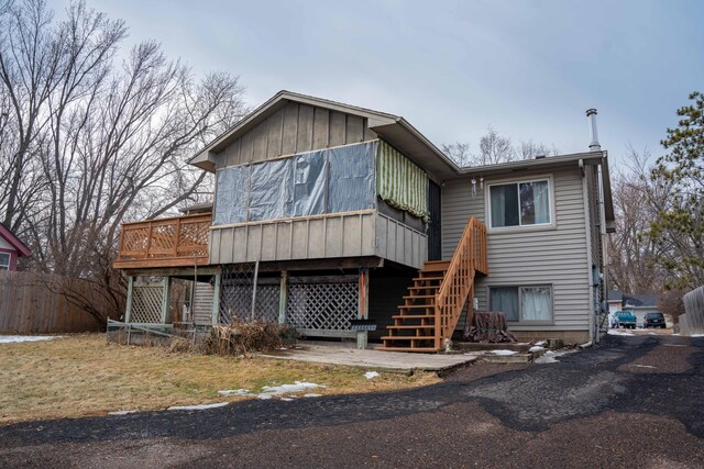 view of front of house with a deck