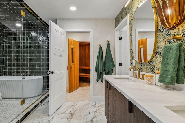 bathroom with vanity and a bath