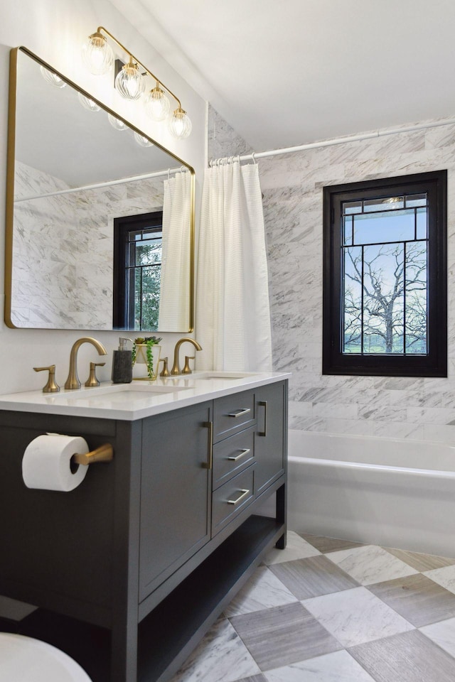 bathroom with vanity and shower / bath combo with shower curtain