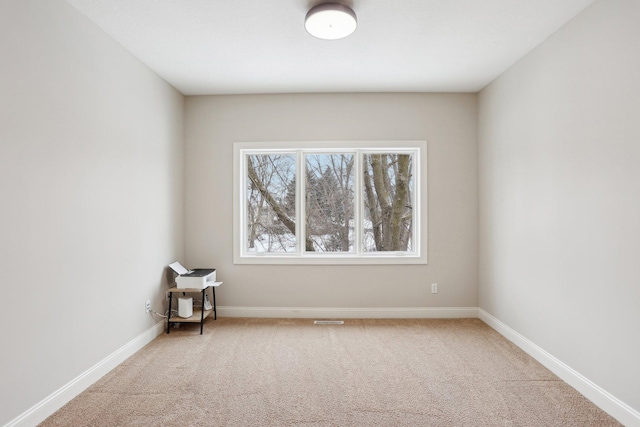 view of carpeted spare room