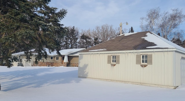 view of snow covered property