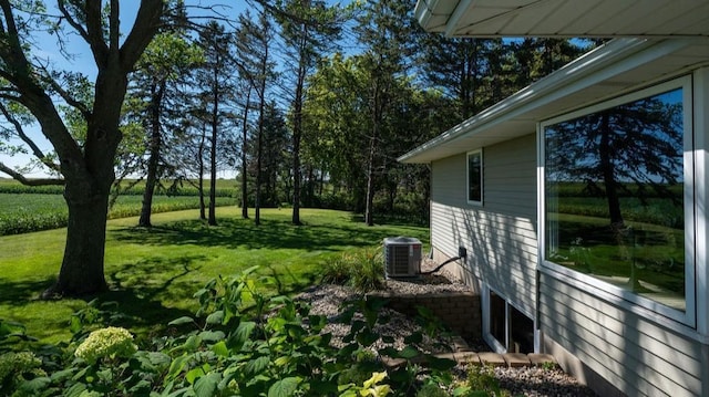 view of yard featuring central AC