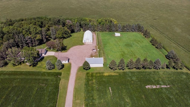 birds eye view of property with a rural view