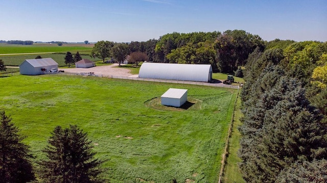 birds eye view of property featuring a rural view