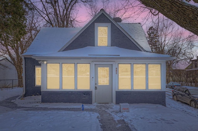 view of snow covered property