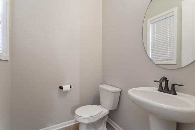 bathroom with sink and toilet