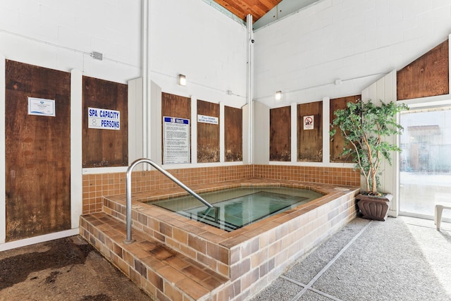 interior space with an indoor hot tub