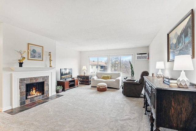 living room featuring a fireplace with flush hearth, carpet, and a wall unit AC