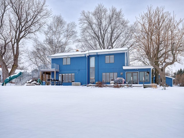 view of snow covered property