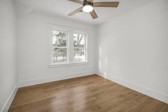 unfurnished room featuring ceiling fan and hardwood / wood-style floors