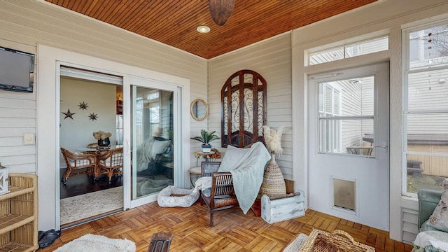 sunroom with wood ceiling