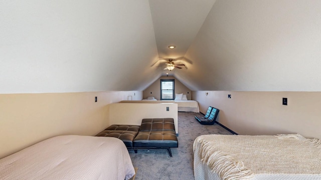 bedroom featuring lofted ceiling and carpet flooring