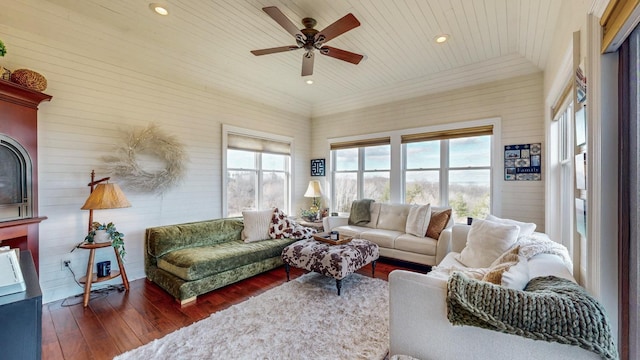 living area featuring wooden ceiling, ceiling fan, crown molding, recessed lighting, and wood-type flooring