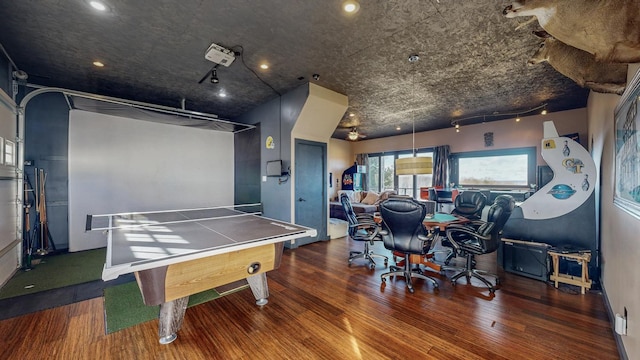 game room featuring wood finished floors and recessed lighting