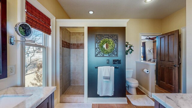 30150 715th St, Lake City, MN 55041 - full bathroom featuring vanity, toilet, walk in shower, tile patterned floors, and recessed lighting