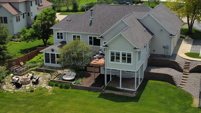 30150 715th St, Lake City, MN 55041 - rear view of house featuring a fire pit, a wooden deck, and roof with shingles