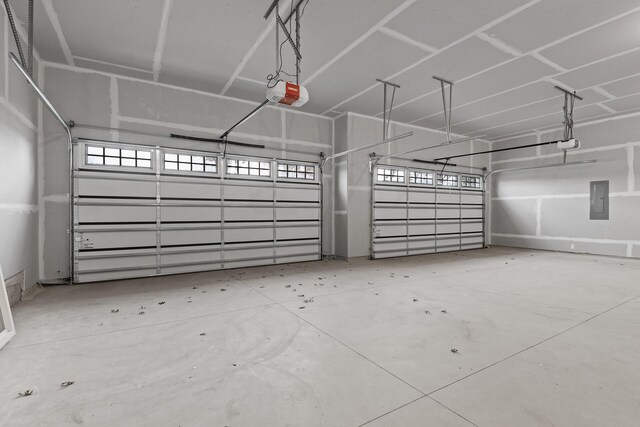 22816 Jarvis St NW, Elk River, MN 55330 - garage featuring a garage door opener and electric panel