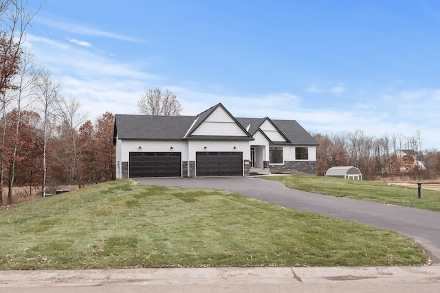 22816 Jarvis St NW, Elk River, MN 55330 - view of front facade featuring a garage and a front yard