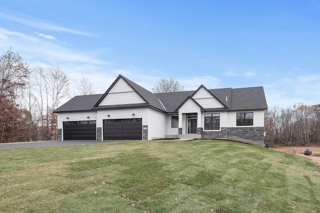 22816 Jarvis St NW, Elk River, MN 55330 - modern inspired farmhouse with a garage and a front lawn