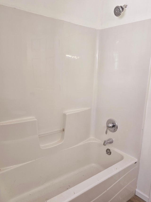 bathroom featuring washtub / shower combination