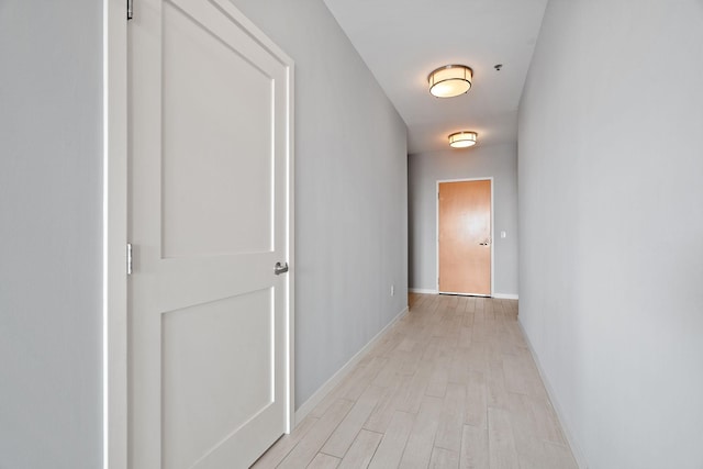 corridor featuring light wood-type flooring