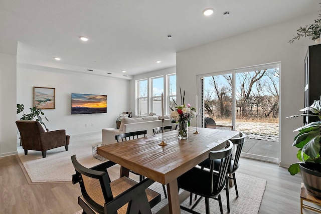 dining room featuring light hardwood / wood-style flooring