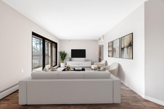 6615 Lake Shore Dr S Unit 311, Richfield, MN 55423 - living area with a baseboard heating unit and wood finished floors