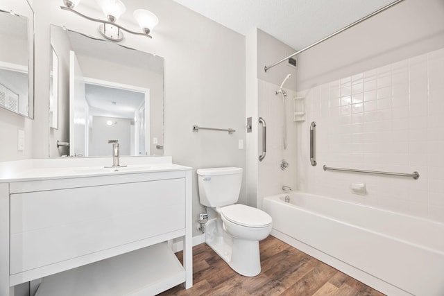 6615 Lake Shore Dr S Unit 311, Richfield, MN 55423 - full bath featuring bathtub / shower combination, vanity, and wood finished floors