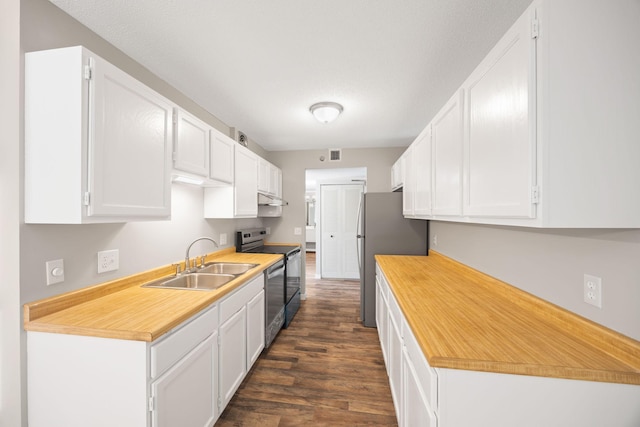 6615 Lake Shore Dr S Unit 311, Richfield, MN 55423 - kitchen with appliances with stainless steel finishes, white cabinetry, light countertops, and under cabinet range hood